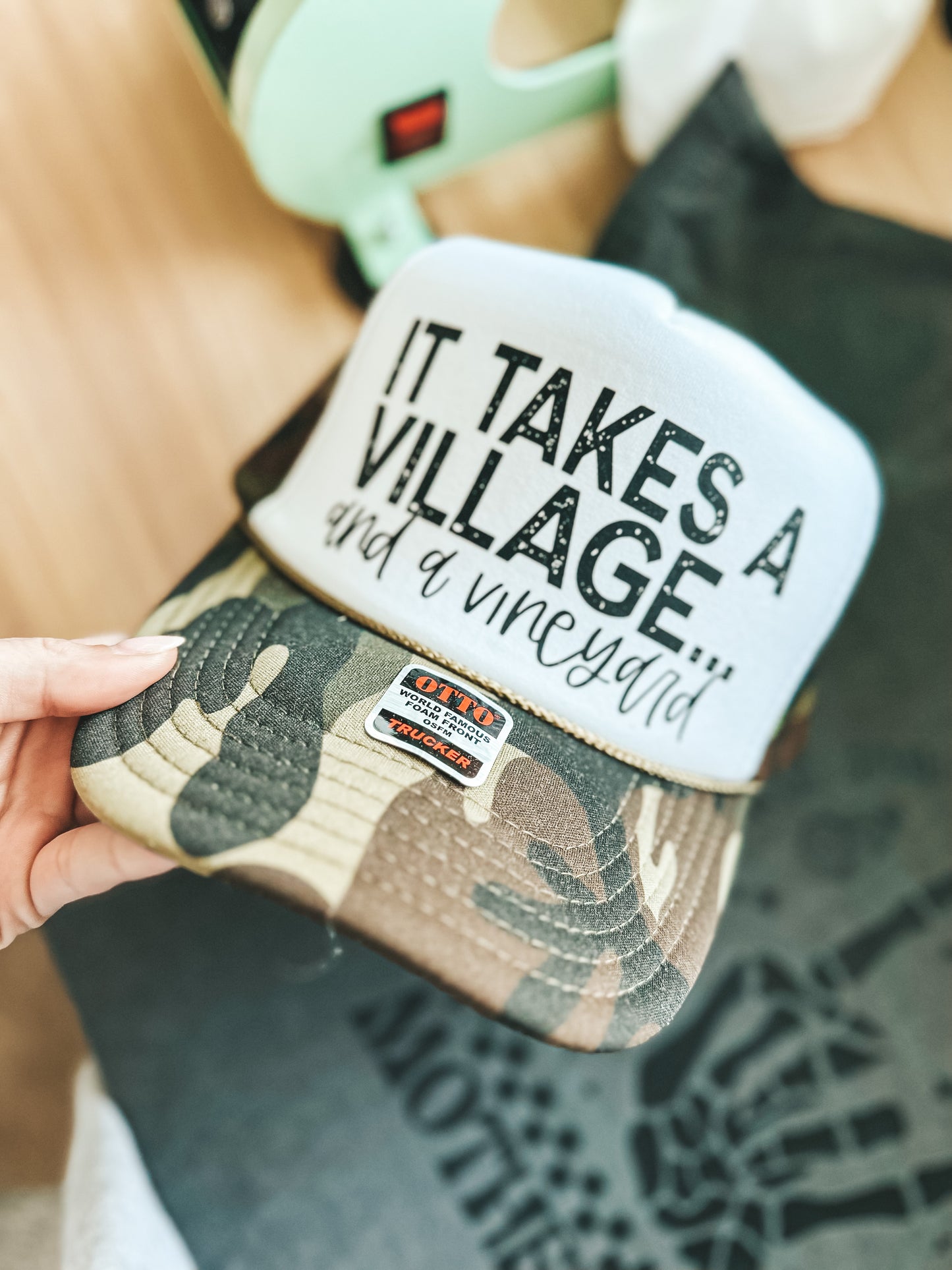 takes a village hat